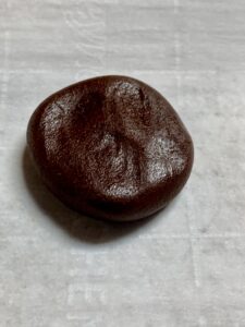 flatten Oreo Cakester dough ball
