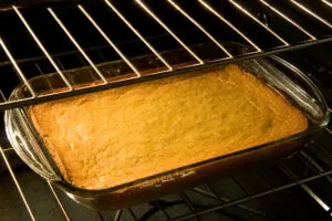 cornbread in pan in oven