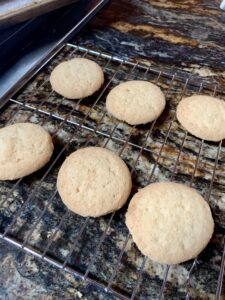 crispy lemon cookies on cooling rack